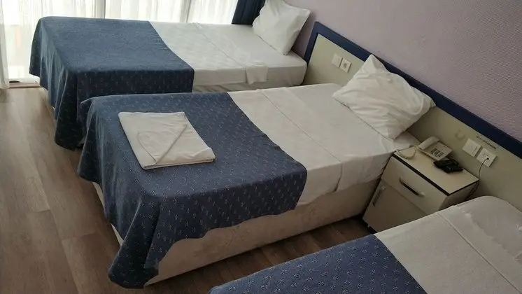 Üç Kişilik Oda