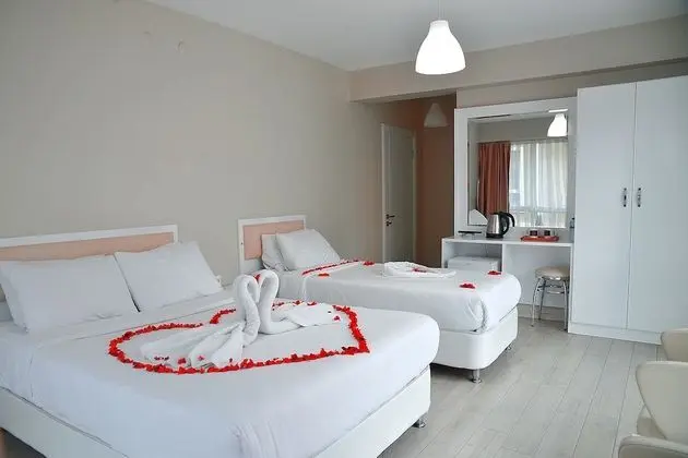 Üç Kişilik Oda