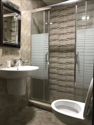 Büyük Yataklı Tek Kişilik Oda