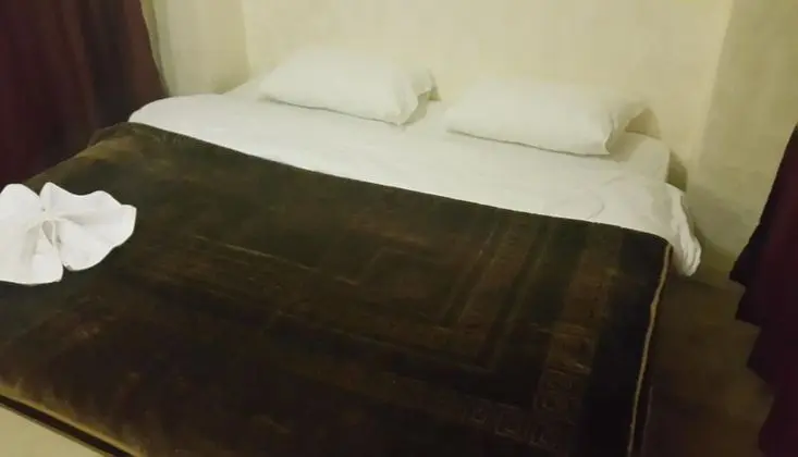 Basic Tek Büyük veya İki Ayrı Yataklı Oda