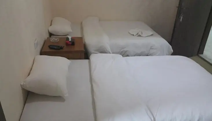 Basic Tek Büyük veya İki Ayrı Yataklı Oda