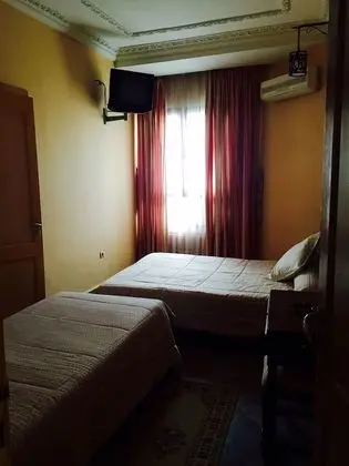 Üç Kişilik Oda