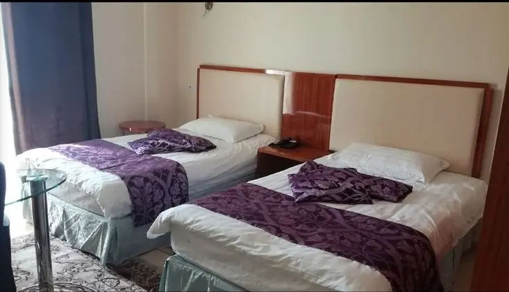 Üç Kişilik Oda