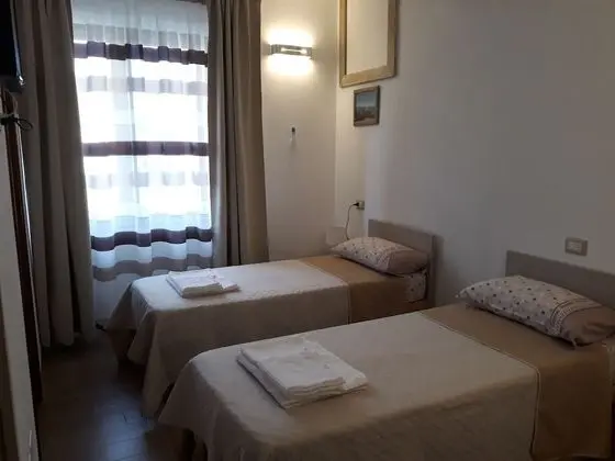 Deluxe Tek Büyük veya İki Ayrı Yataklı Oda