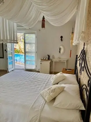 Deluxe Oda, Kara veya Havuz Manzaralı