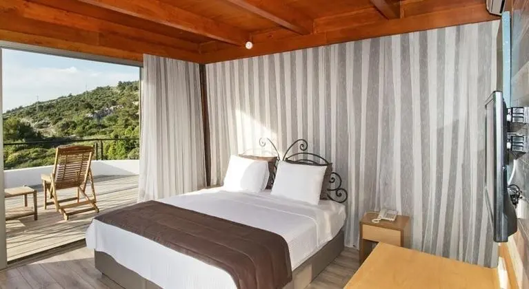 https://imagessl.etstur.com/files/images/hotelImages/TR/53169/l/Villa-Renk-Otel-Alacati-Oda-38920.jpg