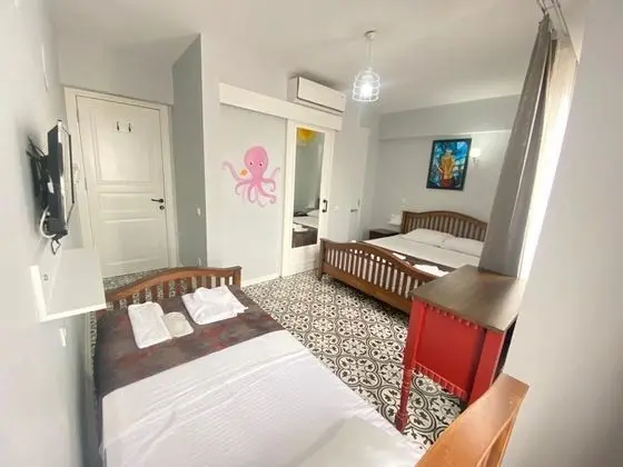 Üç Kişilik Oda
