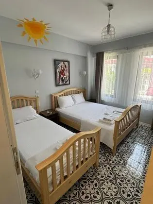 Üç Kişilik Oda
