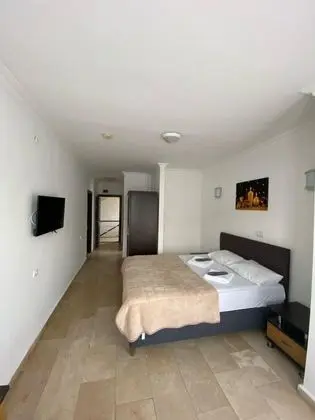 Üç Kişilik Oda, Şehir veya Dağ Manzaralı, Balkonlu