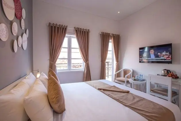 Deluxe Tek Büyük veya İki Ayrı Yataklı Oda