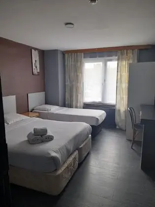 Üç Kişilik Oda