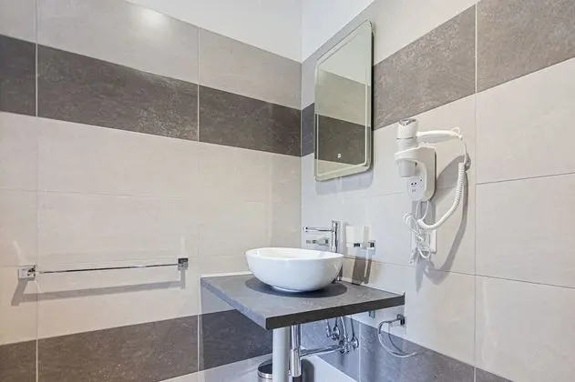 Deluxe Tek Büyük veya İki Ayrı Yataklı Oda