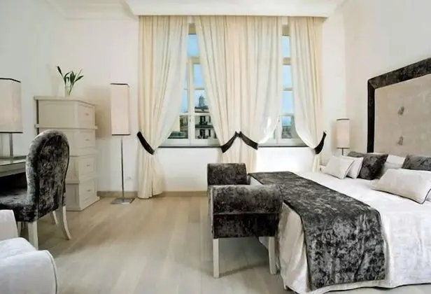 Deluxe Tek Büyük veya İki Ayrı Yataklı Oda