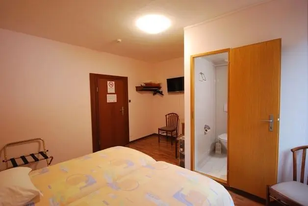 Economy Tek Büyük veya İki Ayrı Yataklı Oda