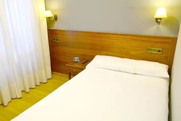 Basic Tek Büyük veya İki Ayrı Yataklı Oda