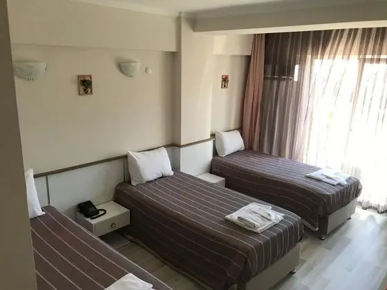 Üç Kişilik Oda