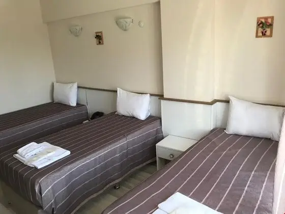 Üç Kişilik Oda