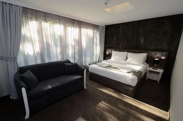 Deluxe Tek Büyük veya İki Ayrı Yataklı Oda