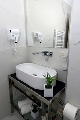Deluxe Tek Büyük veya İki Ayrı Yataklı Oda