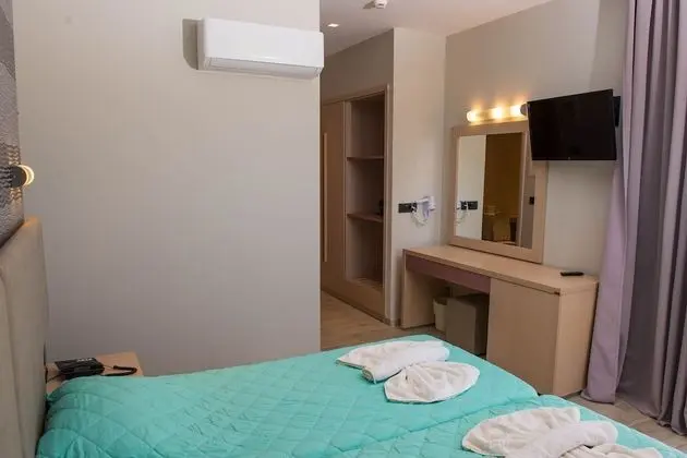 Deluxe Tek Büyük veya İki Ayrı Yataklı Oda