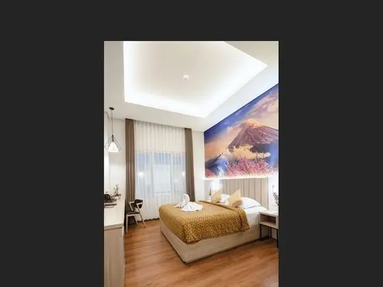 Deluxe Tek Büyük Yataklı Oda