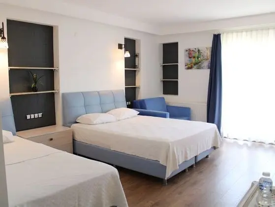 Deluxe 3 Kişilik Verandalı Oda