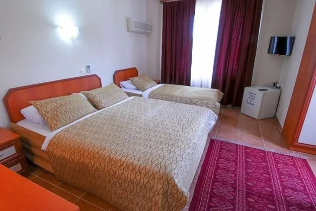 Üç Kişilik Oda