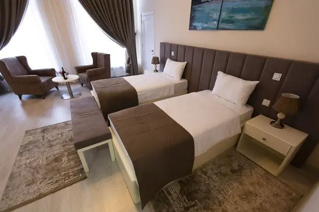 Deluxe Tek Büyük veya İki Ayrı Yataklı Oda