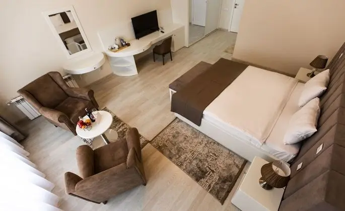 Deluxe Tek Büyük veya İki Ayrı Yataklı Oda