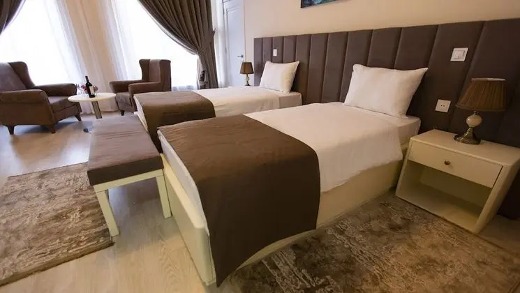 Deluxe Tek Büyük veya İki Ayrı Yataklı Oda