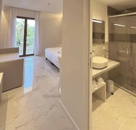 Deluxe Tek Büyük veya İki Ayrı Yataklı Oda