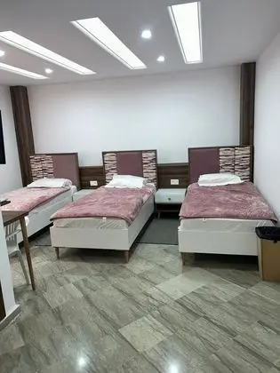 Üç Kişilik Oda