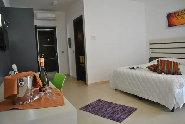 Deluxe Tek Büyük veya İki Ayrı Yataklı Oda