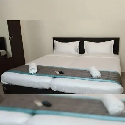 Deluxe Tek Büyük veya İki Ayrı Yataklı Oda