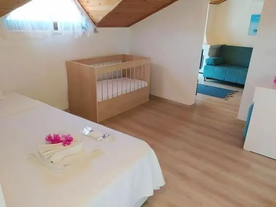 Deluxe Çatı Katı (Loft), 1 Yatak Odası, Şömine, Deniz Manzaralı