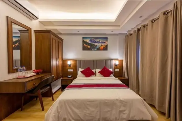 Deluxe Tek Büyük veya İki Ayrı Yataklı Oda