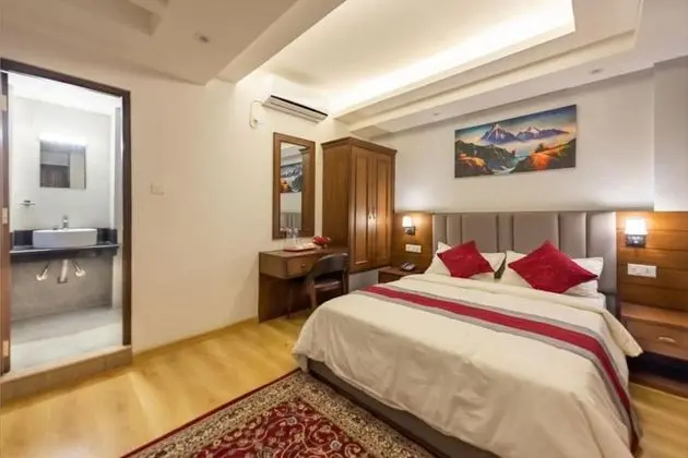 Deluxe Tek Büyük veya İki Ayrı Yataklı Oda