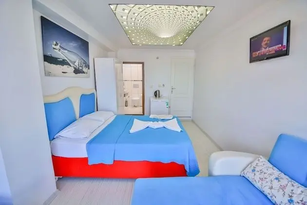 Standard Dört Kişilik Oda, 1 Yatak Odası, Sigara İçilebilir, Plaj Manzaralı
