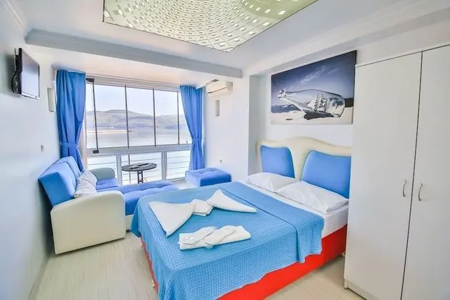 Standard Dört Kişilik Oda, 1 Yatak Odası, Sigara İçilebilir, Plaj Manzaralı