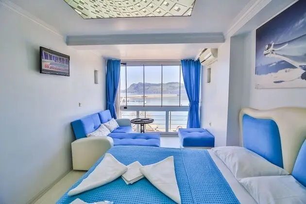Standard Dört Kişilik Oda, 1 Yatak Odası, Sigara İçilebilir, Plaj Manzaralı