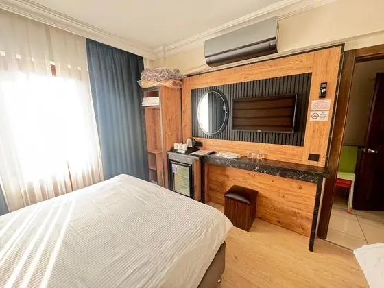 3 KİŞİLİK BALKONLU ODA