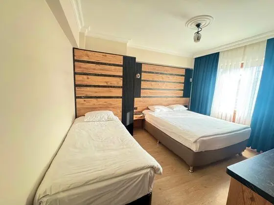 3 KİŞİLİK BALKONLU ODA