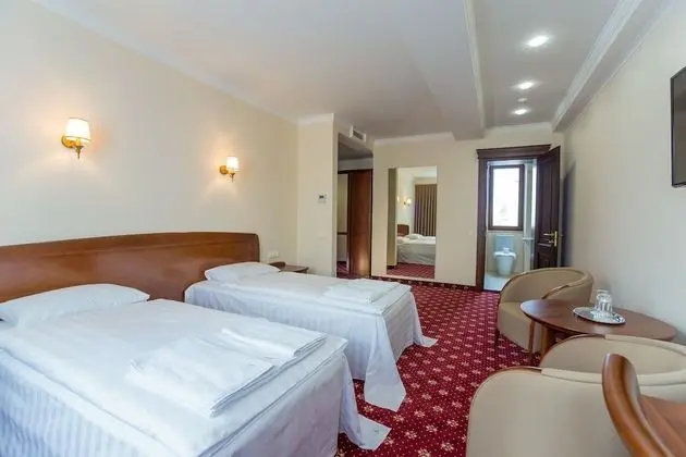 Deluxe Tek Büyük veya İki Ayrı Yataklı Oda