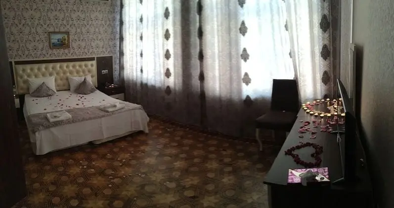 Üç Kişilik Oda