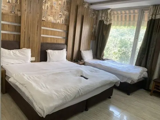 Deluxe Üç Kişilik Oda