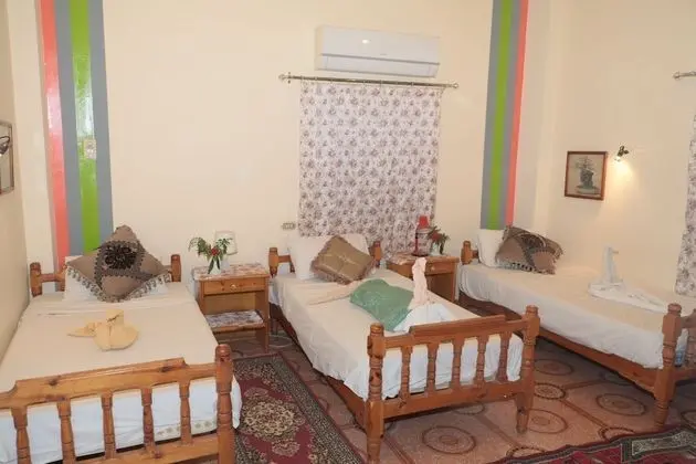 Deluxe Üç Kişilik Oda, Bahçe Manzaralı