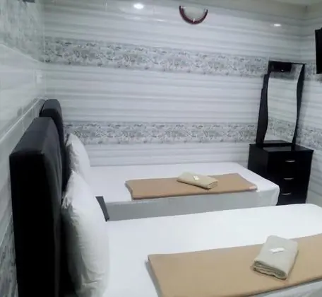 Üç Kişilik Oda