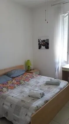 Tek Büyük veya İki Ayrı Yataklı Oda, Ortak Banyo, Bahçe Manzaralı