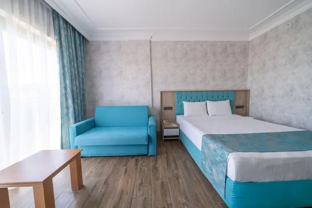 https://images.etstur.com/imgproxy/resize/2560x1440/files/images/hotelImages/etsrooms/512123/Anadolu_Hotels_Didim_Club_20250918112340_2.jpg