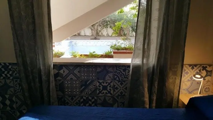 Comfort Tek Büyük veya İki Ayrı Yataklı Oda, Havuz Manzaralı